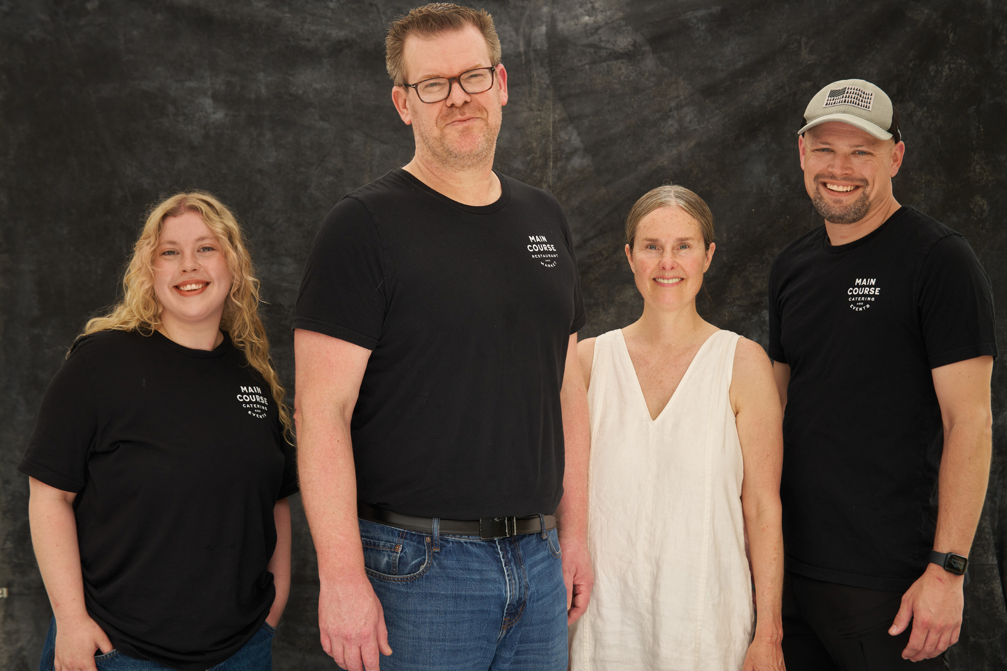 The Main Course team in a Chronogram Magazine editorial portrait, July 2026 — Shawn Harrison, Matt Gaines, Chris Dodd, and Angie O'Connor