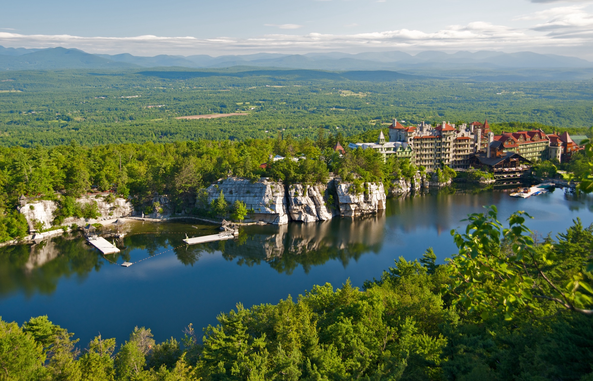 Lake Mohonk and the Mohonk Mountain House — the Victorian castle resort on the lake's shore at the foot of the Shawangunk cliffs