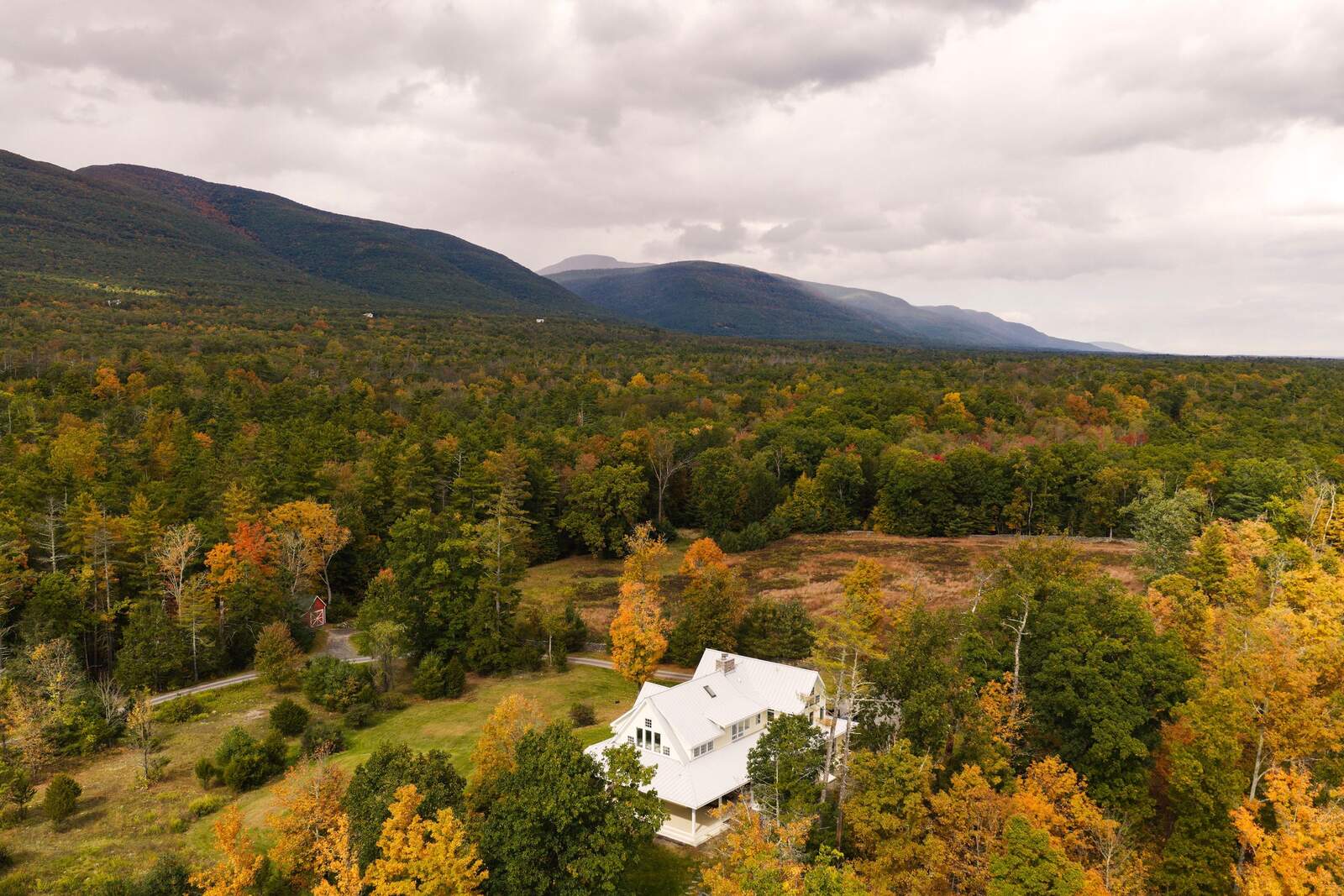 The farmhouse, the meadow and the Catskills from above.
