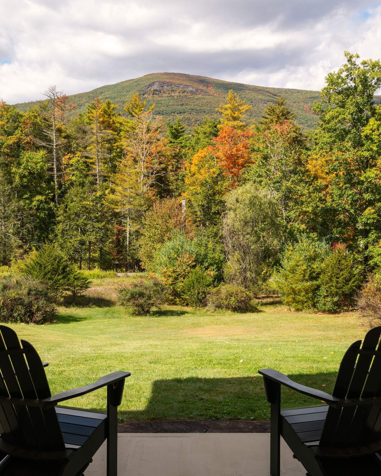 The mountain from the porch, between two chairs.