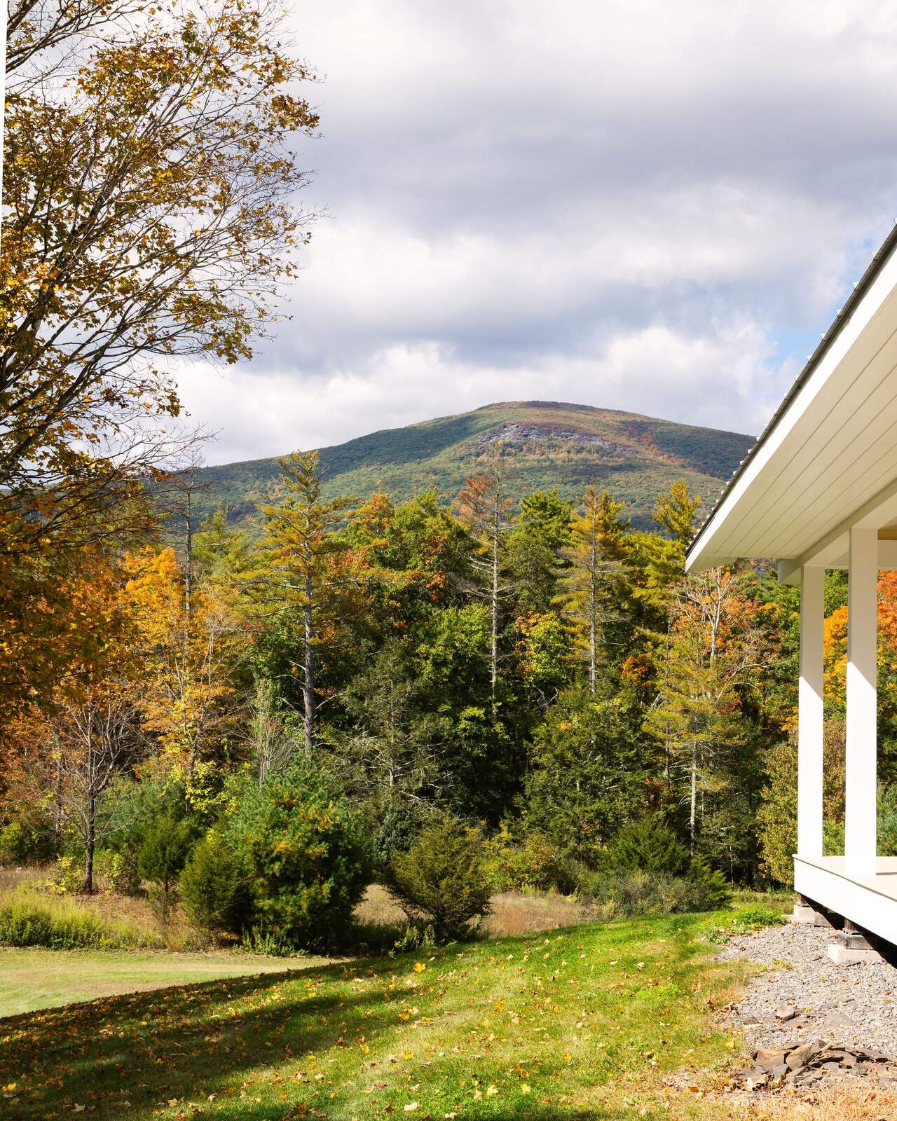 The mountain beyond the porch roof.