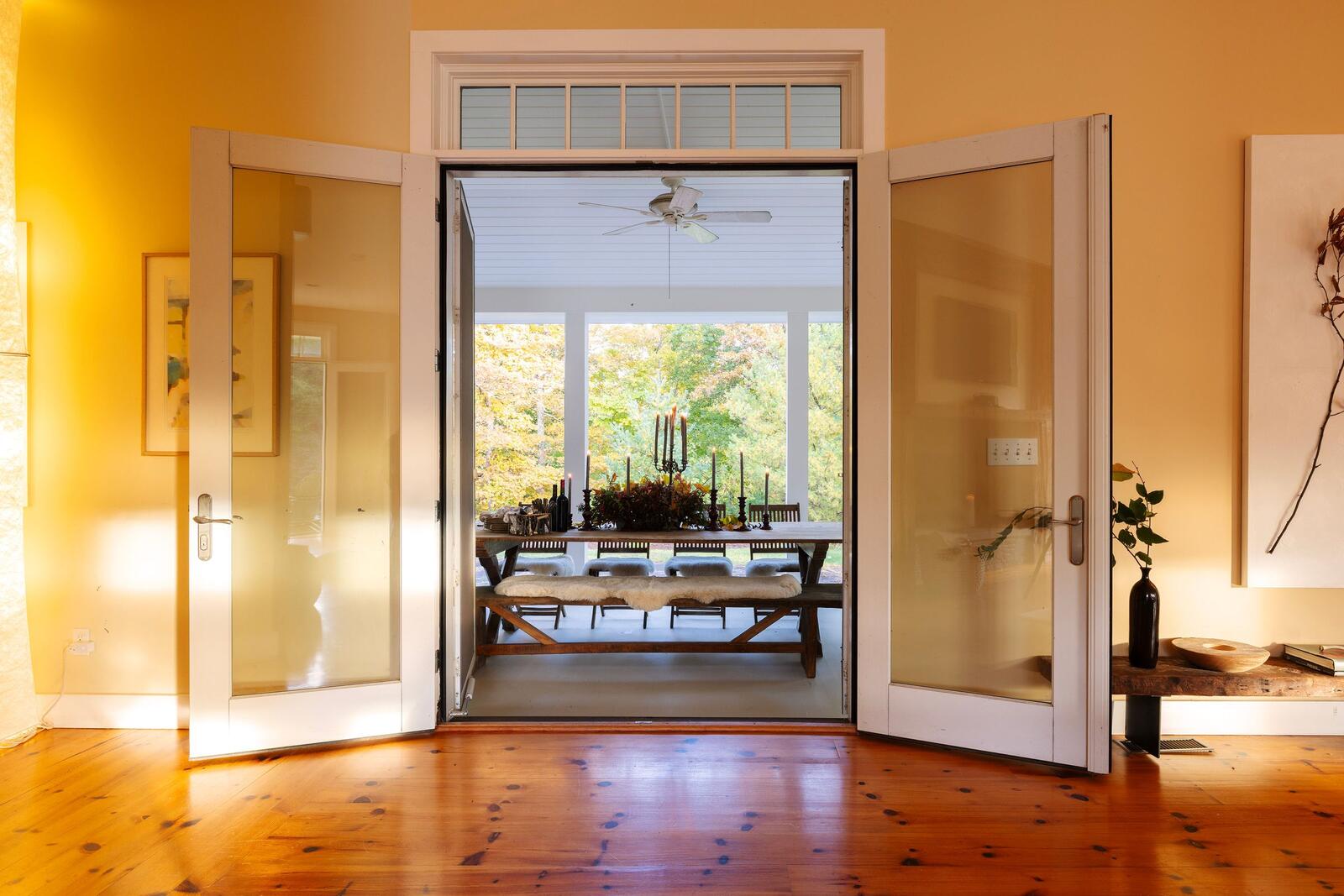 French doors from the great room to the porch table.