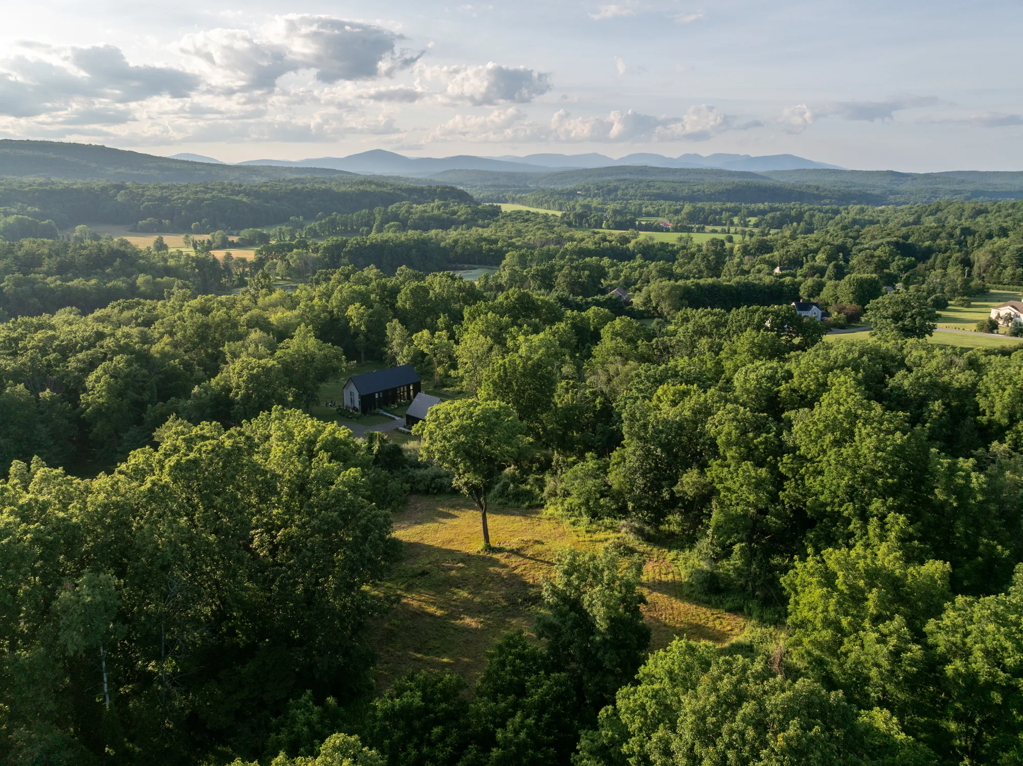 Aerial — the ridge and the mountains beyond