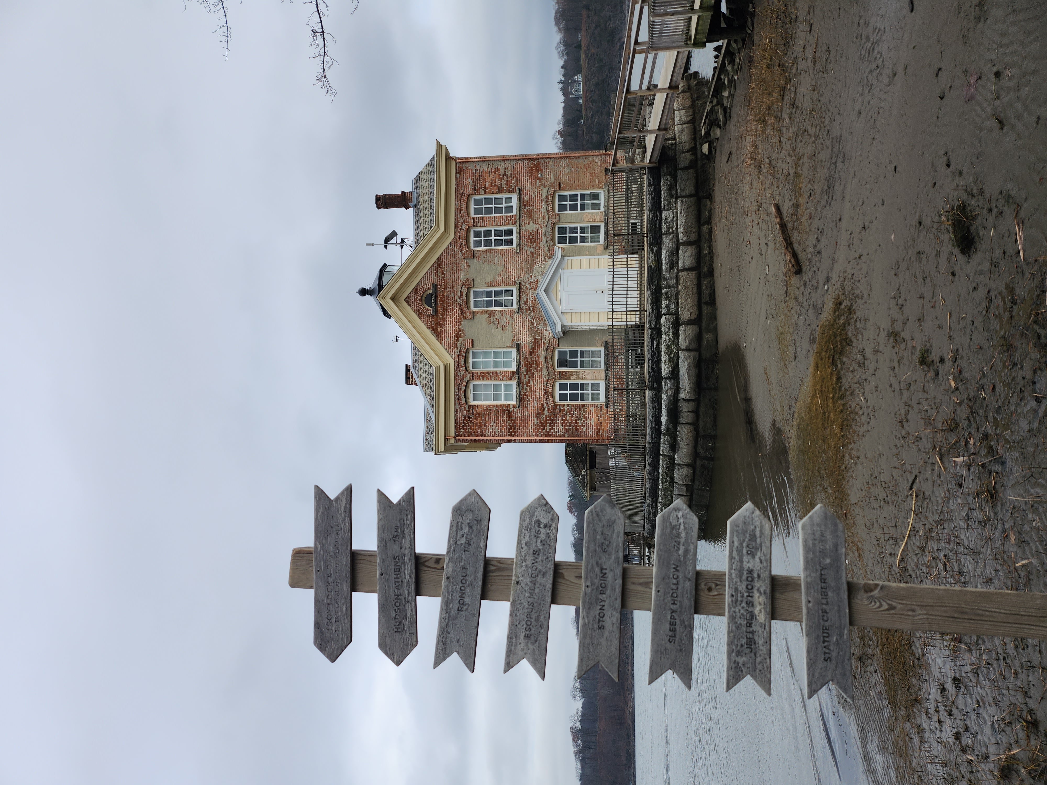 The Saugerties Lighthouse at the mouth of the Esopus Creek where it meets the Hudson — the 1869 brick lighthouse, now a bed-and-breakfast reached by a half-mile nature trail