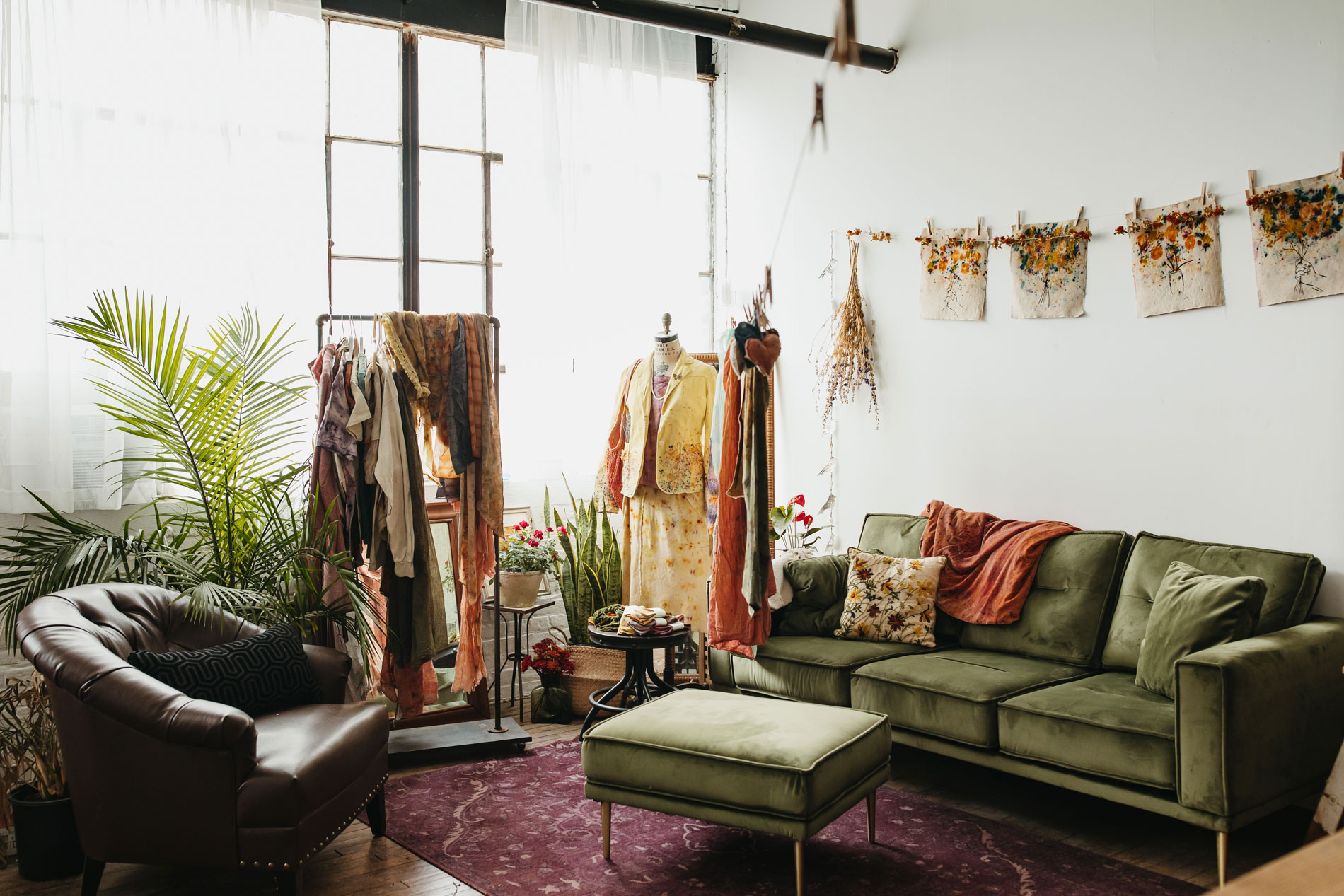 A live/work artist's space inside The Shirt Factory — natural north light, exposed brick, a working studio with a kitchen built in