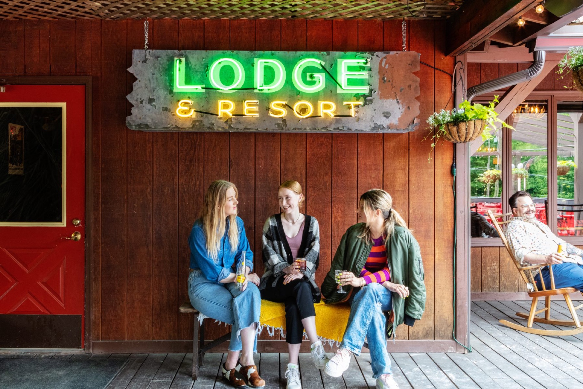 Urban Cowboy Lodge & Resort — porch signage and arrival